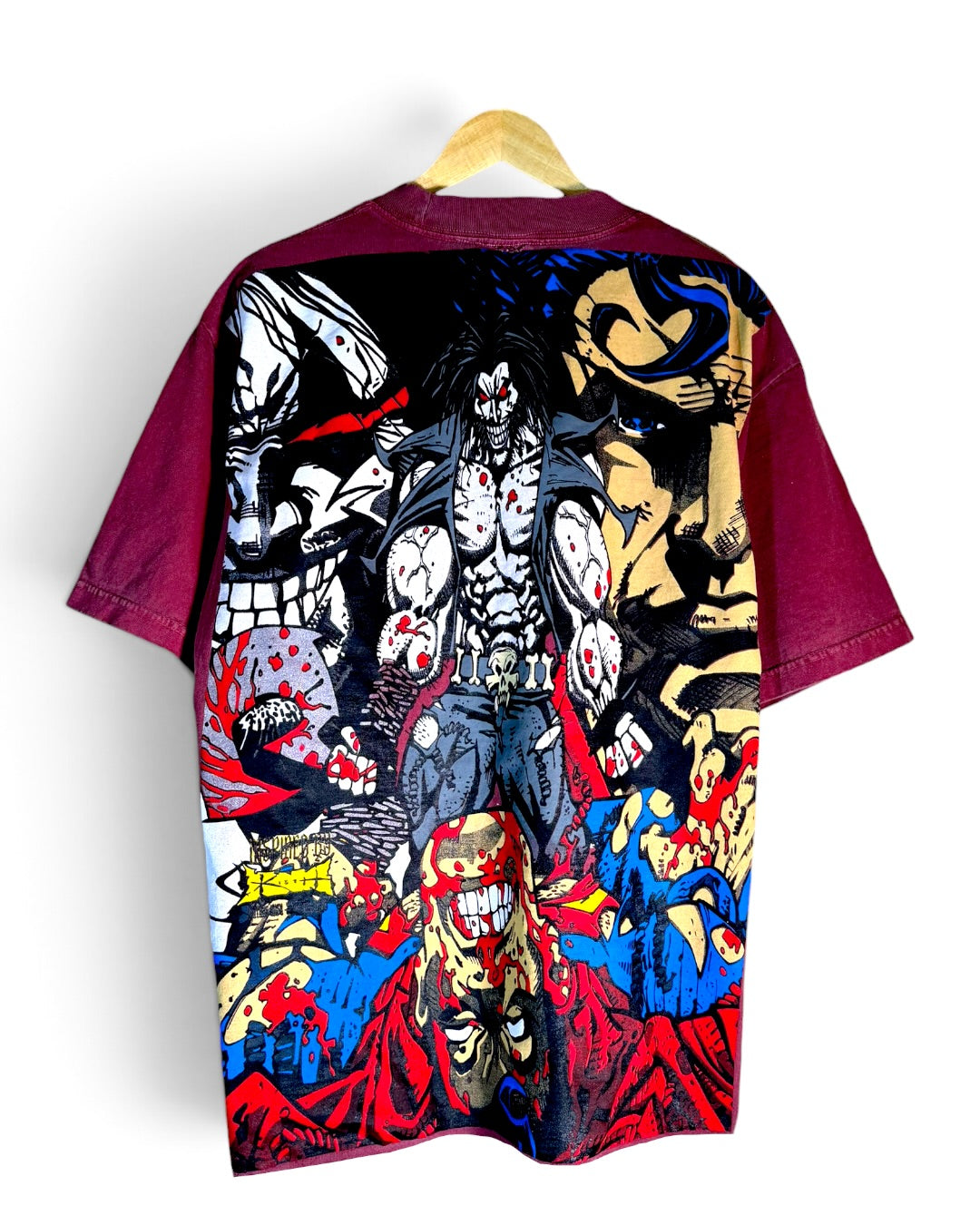 Faded Red - Spine Ripped Front - Lobo Wins Back