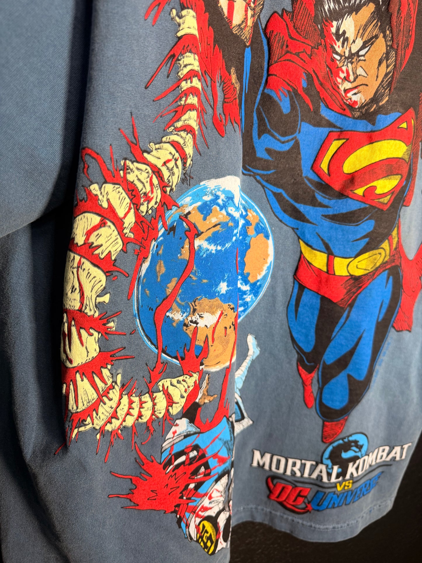 Faded blue - Superman Fatality Kills front  - Sub Zero Fatality