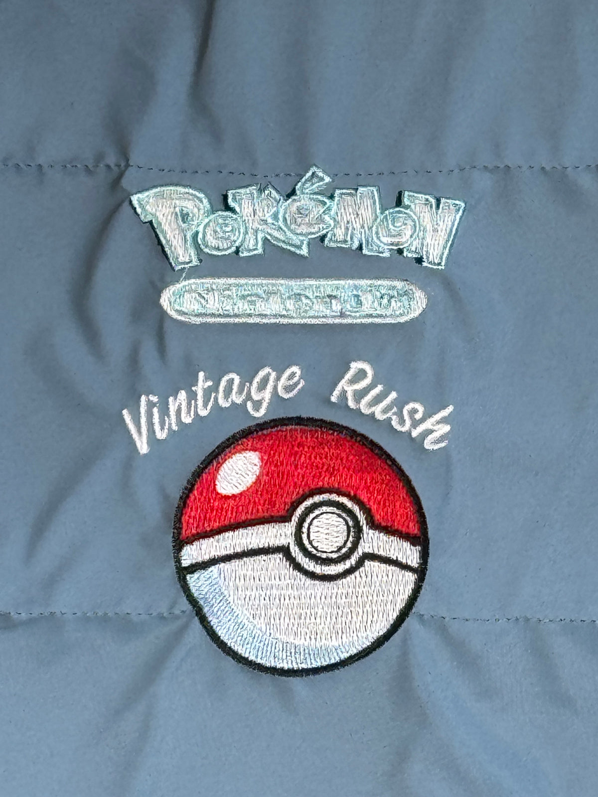 Blue Puffer Jacket - Blastoise