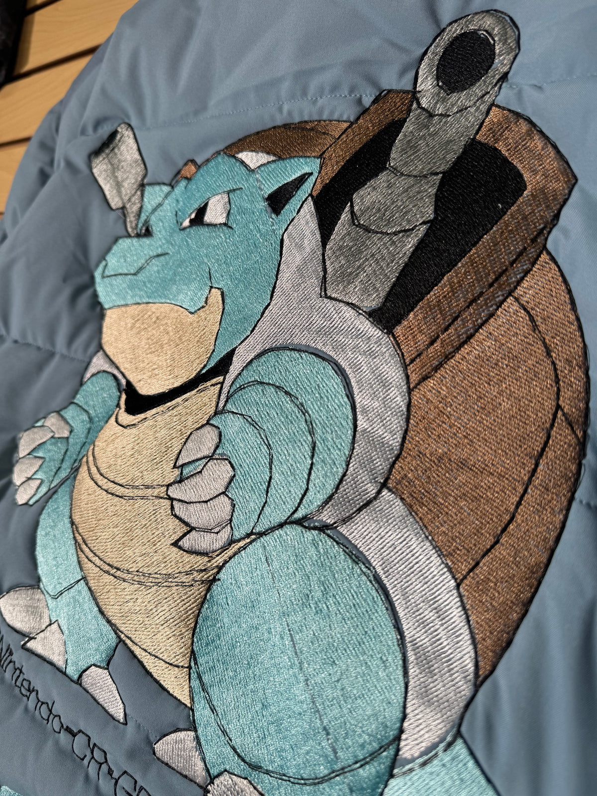 Blue Puffer Jacket - Blastoise